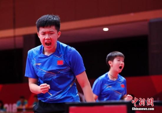 資料圖：雅加達亞運會，王楚欽/孫穎莎奪得混雙冠軍。 <a target='_blank' href='/'>中新社</a>記者 劉關關 攝