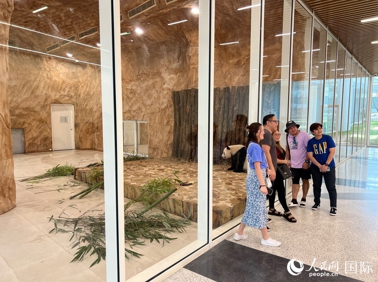 當(dāng)?shù)赜慰团c“四?！焙嫌?。人民網(wǎng)記者 張志文攝