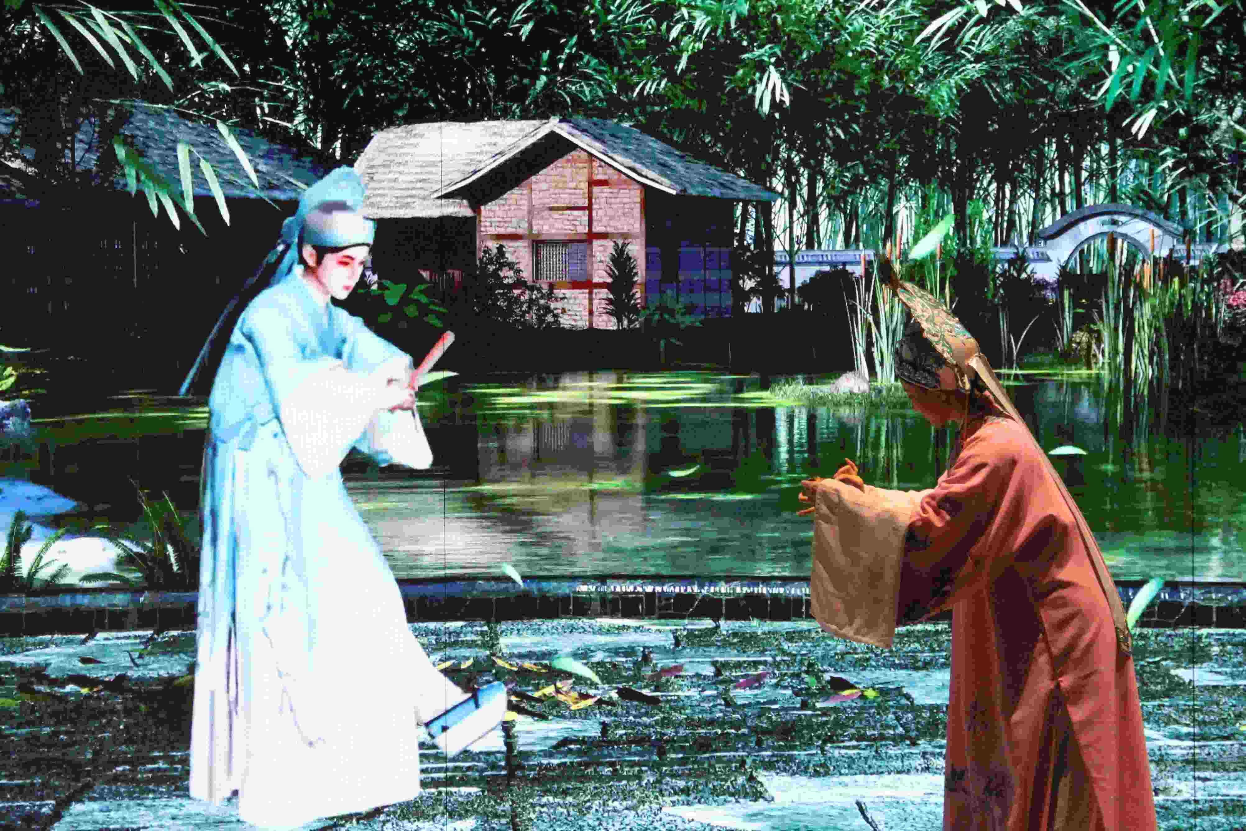 真人演員與虛擬人演員在“元啟金陵”南京數(shù)字文化客廳出演《梁山伯與祝英臺》經(jīng)典選段。受訪者供圖