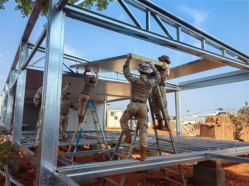 小組協(xié)同推進工程任務(wù)。鄧原淘攝